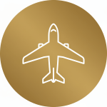 Icon of an airplane over a gold circular background, representing travel and aviation.